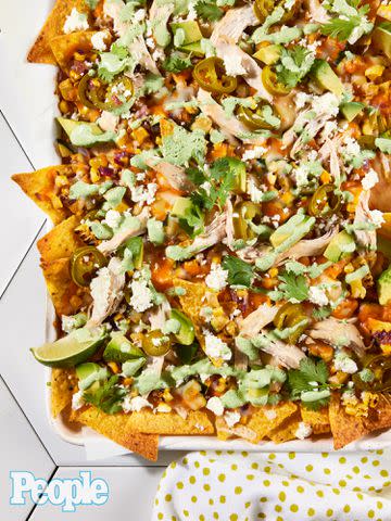 <p>Jennifer Causey</p> Cameron Diaz's Pulled Chicken Nachos With Corn, Zucchini, Squash & Cilantro Crema