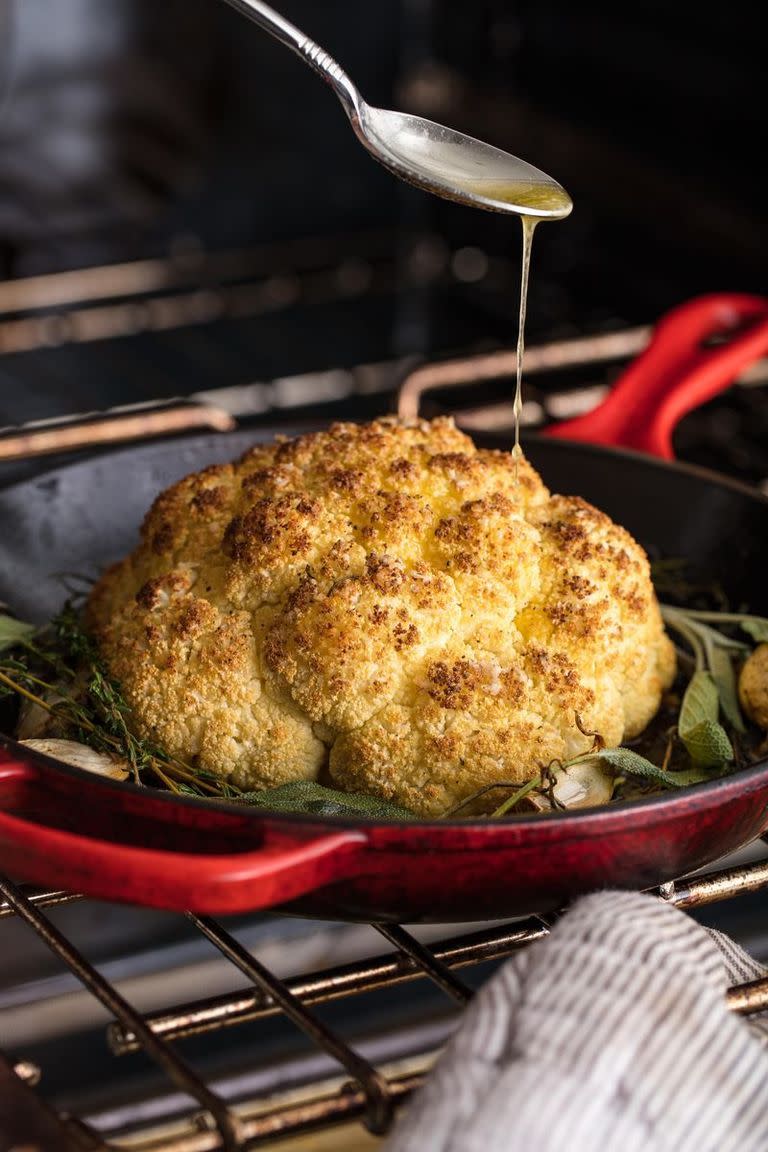 <p>If there's gravy involved, no ones gonna miss the potatoes.</p><p>Get the <a href="https://www.delish.com/uk/cooking/recipes/a29695647/thanksgiving-cauliflower-recipe/" rel="nofollow noopener" target="_blank" data-ylk="slk:Whole Roasted Cauliflower;elm:context_link;itc:0;sec:content-canvas" class="link ">Whole Roasted Cauliflower</a> recipe.</p>
