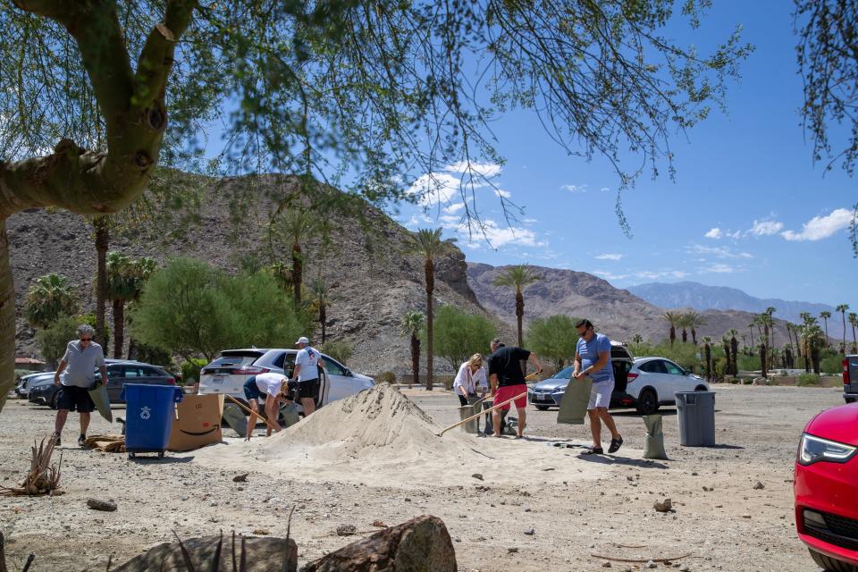 Ahead of widespread rain as Hurricane Hilary comes closer to the Coachella Valley, residents fill sandbags at the Rancho Mirage Library and Observatory in Rancho Mirage, Calif., on Friday, August 18, 2023.