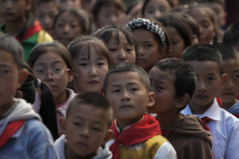 Tibetan students line up to enter a canteen for their meals at the Shangri-La Key Boarding School during a media-organized tour in Dabpa county, Kardze Prefecture, Sichuan province, China on Sept. 5, 2023. (AP Photo/Andy Wong)