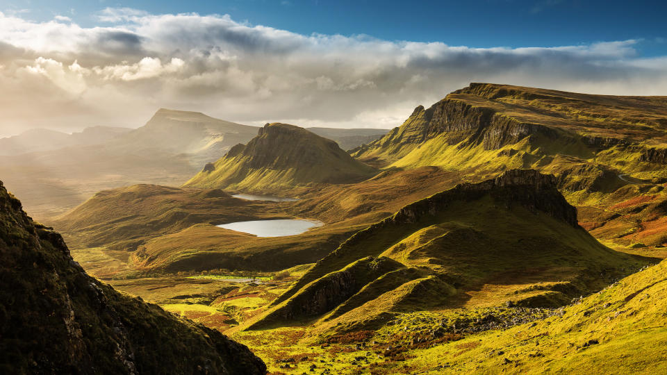 Lush mountains reaching into the clouds