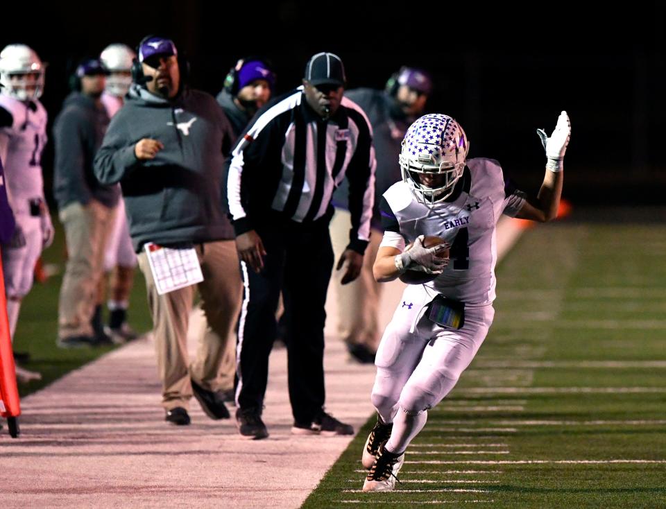 Early's John-Stewart Gordon carefully runs along the border of the field before cutting back to the inside during a playoff game against Shallowater on Nov. 19. Gordon is the Class 3A All-Big Country Defensive MVP.