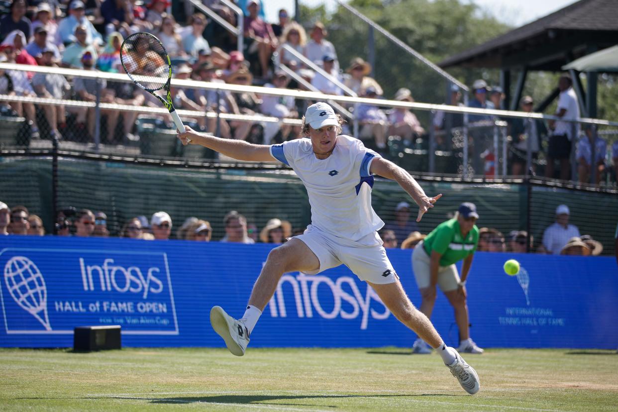 Alex Michelsen stretches to reach a shot in Newport on Sunday.