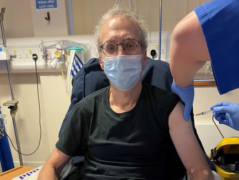 FILE PHOTO: Reuters journalist Steve Stecklow participates in a clinical trial of the experimental Novavax COVID-19 vaccine in London