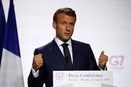 French President Emmanuel Macron attends a press conference during the G7 summit in Biarritz