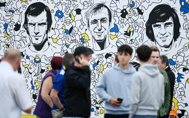 A mural of former players Paul Madeley, Jack Charlton and Peter Lorimer is seen outside the stadium prior to the Premier League match between Leeds United and Tottenham Hotspur at Elland Road - Gareth Copley/Getty Images