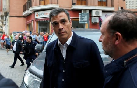 Spain’s acting Prime Minister Pedro Sanchez arrives to visit a flooded town of Orihuela