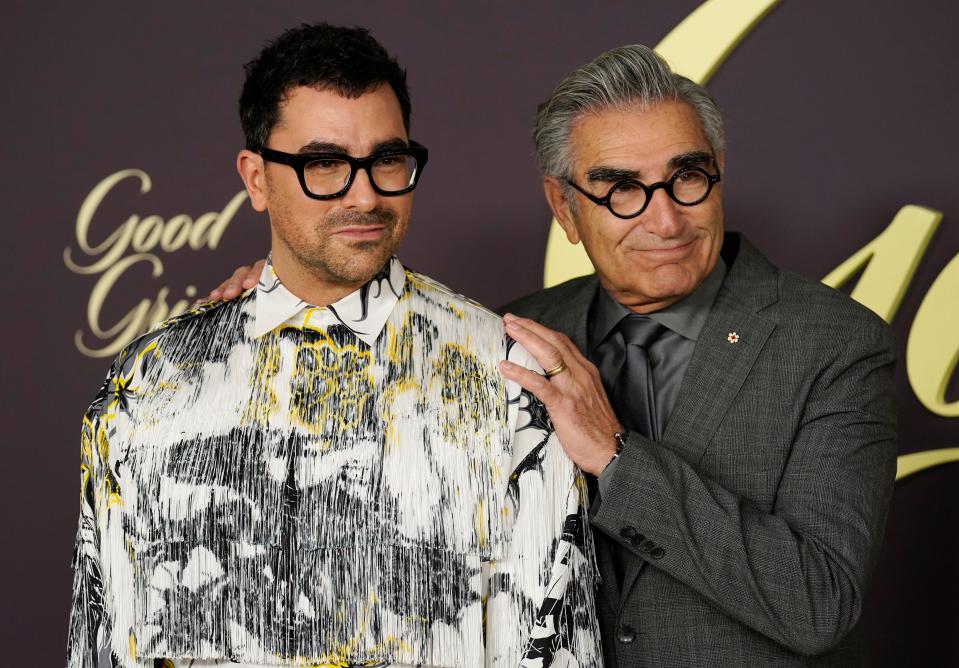 Daniel Levy poses with his father, comedy legend Eugene Levy, at the Hollywood premiere of the Netflix film "Good Grief."