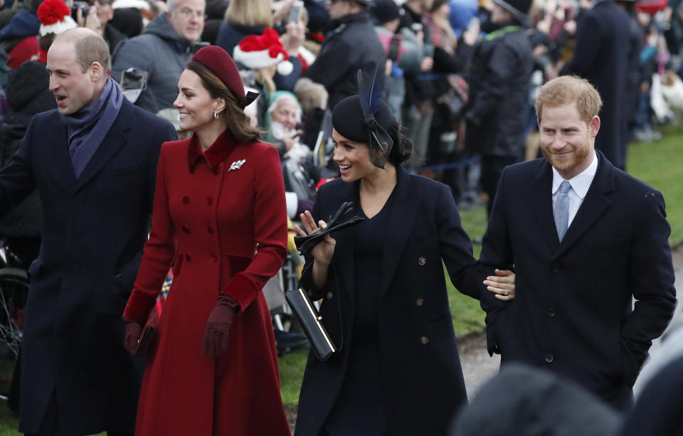 FILE - In this Tuesday, Dec. 25, 2018 file photo, Britain's Prince William, left, Kate, Duchess of Cambridge, second left, Meghan Duchess of Sussex and Prince Harry, right, arrive to attend the Christmas day service at St Mary Magdalene Church in Sandringham in Norfolk, England. Prince William infuriated Prince Harry when he told his younger brother he should move slowly in his relationship with the former Meghan Markle, fearing that he was being “blindsided by lust,’’ a new book on the Windsors says. The second installment of a serialized version of the book “Finding Freedom,” which appeared in the Sunday Times, Sunday, July 26, 2020 claimed that Harry was angered by what he perceived to be as William’s snobby tone in a discussion about the American actress. (AP Photo/Frank Augstein, file)