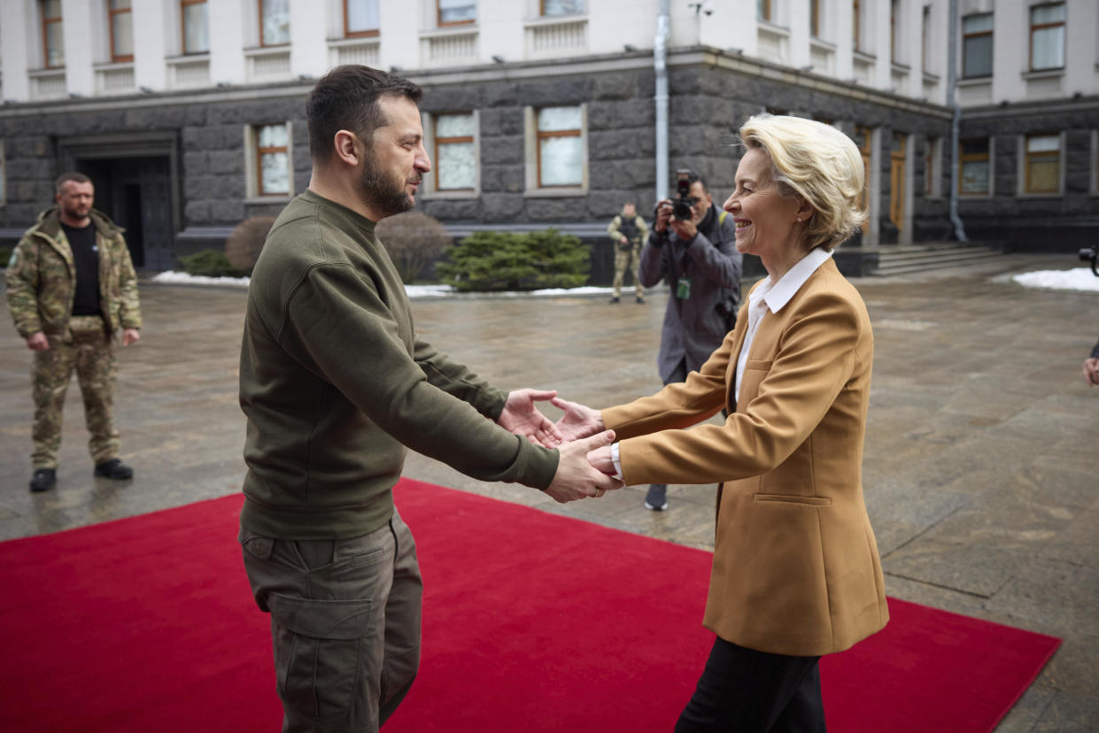 Ukrainian President Volodymyr Zelenskyy, left, and European Commission President Ursula von der Leyen greet each other during the EU-Ukraine summit in Kyiv, Ukraine, Thursday, Feb. 2, 2023. ((Ukrainian Presidential Press Office via AP)