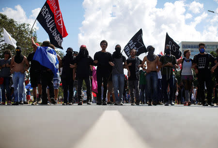 University students protest against cuts to federal spending on higher education planned by Brazil's President Jair Bolsonaro's right-wing government in Brasilia, Brazil May 15, 2019. REUTERS/Adriano Machado