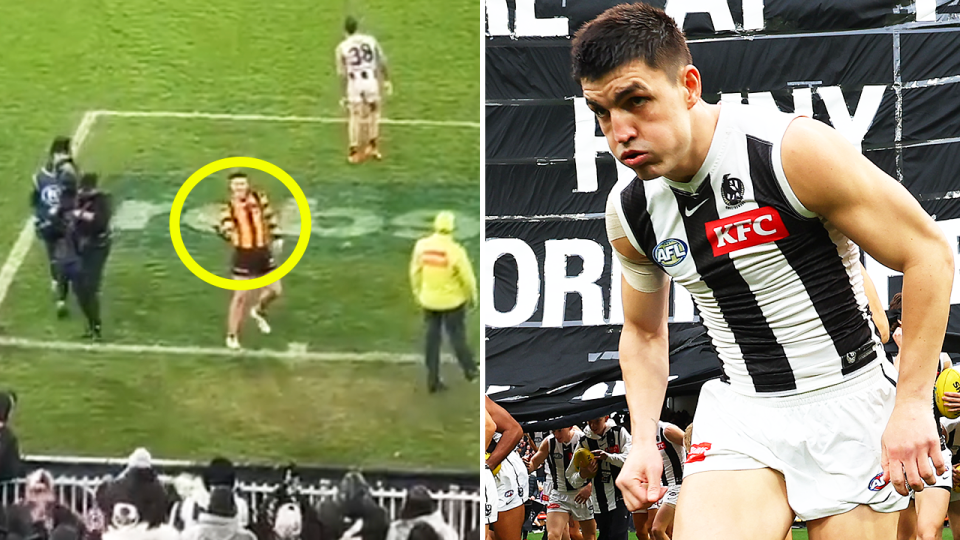 Jack Ginnivan gesturing towards Collingwood fans and Brayden Maynard running out.