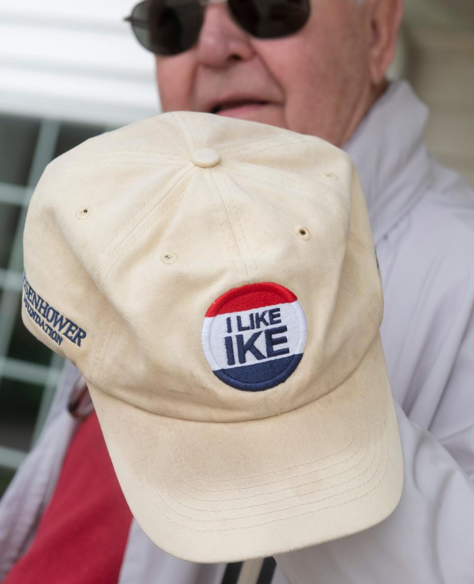 Larry King of Hudson shows off his "I Like Ike" cap at his polling location, the Western Reserve Christian Church, during Tuesday's primary election.