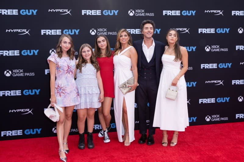 Director Shawn Levy poses with family members and guests at the premiere for the film "Free Guy\