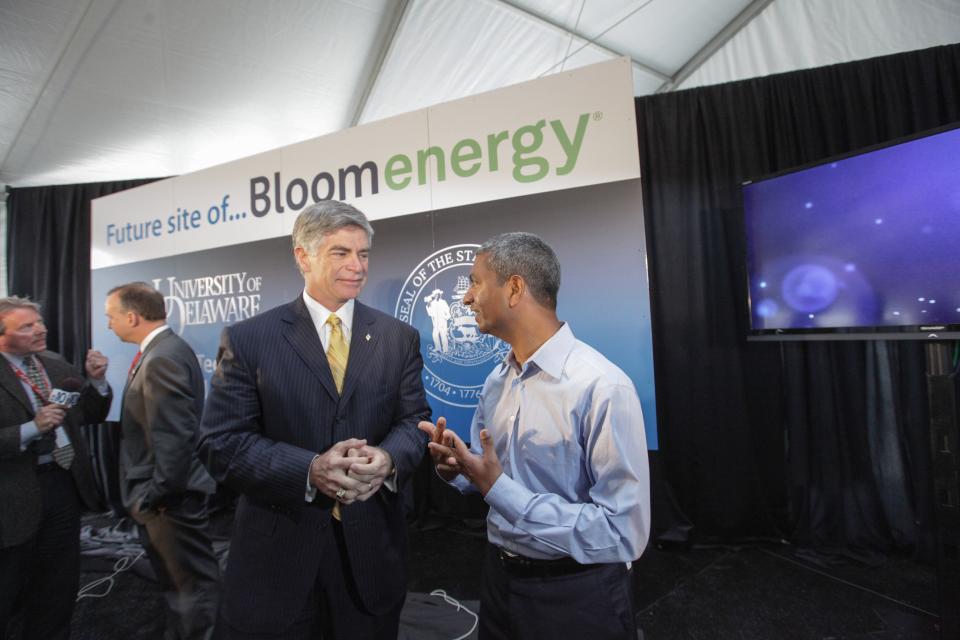 University of Delaware president Patrick Harker, speaks with KR Sridhar, the CEO of Bloom Energy after the groundbreaking ceremony on property of the former Chrysler Plant  April 30, 2012.