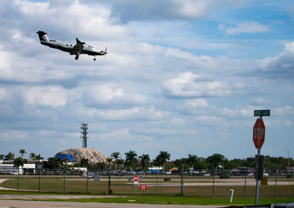 Planes land at the Naples Airport on Thursday, March 14, 2024.