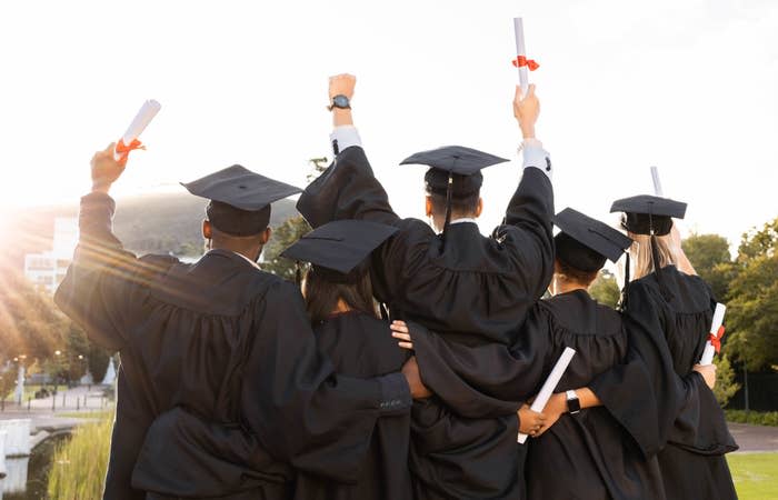 Graduation, group and back view of students celebrate education success