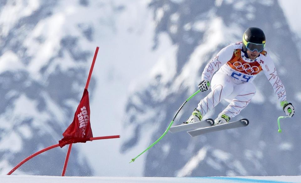 United States' Andrew Weibrecht makes a jump to win the silver medal in the men's super-G at the Sochi 2014 Winter Olympics, Sunday, Feb. 16, 2014, in Krasnaya Polyana, Russia.