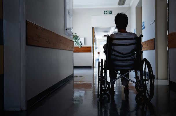 PHOTO: Rearview shot of a senior woman sitting in a wheelchair (STOCK IMAGE/Getty Images)