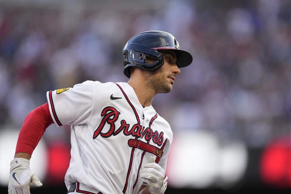 Atlanta Braves' Matt Olson runs after hitting a two-run home run in the first inning of a baseball game against the Philadelphia Phillies, Sunday, May 28, 2023, in Atlanta. (AP Photo/Brynn Anderson)