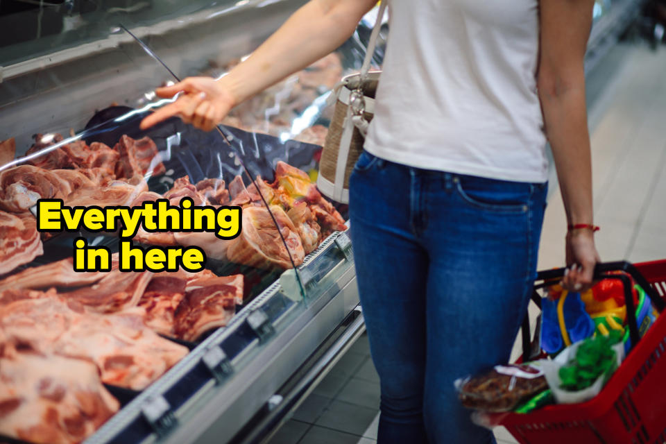 woman pointing to a grocery deli case