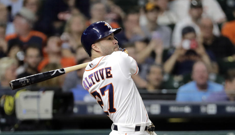 The Astros’ Jose Altuve hits a home run against the Chicago White Sox during the fourth inning Tuesday. (AP)