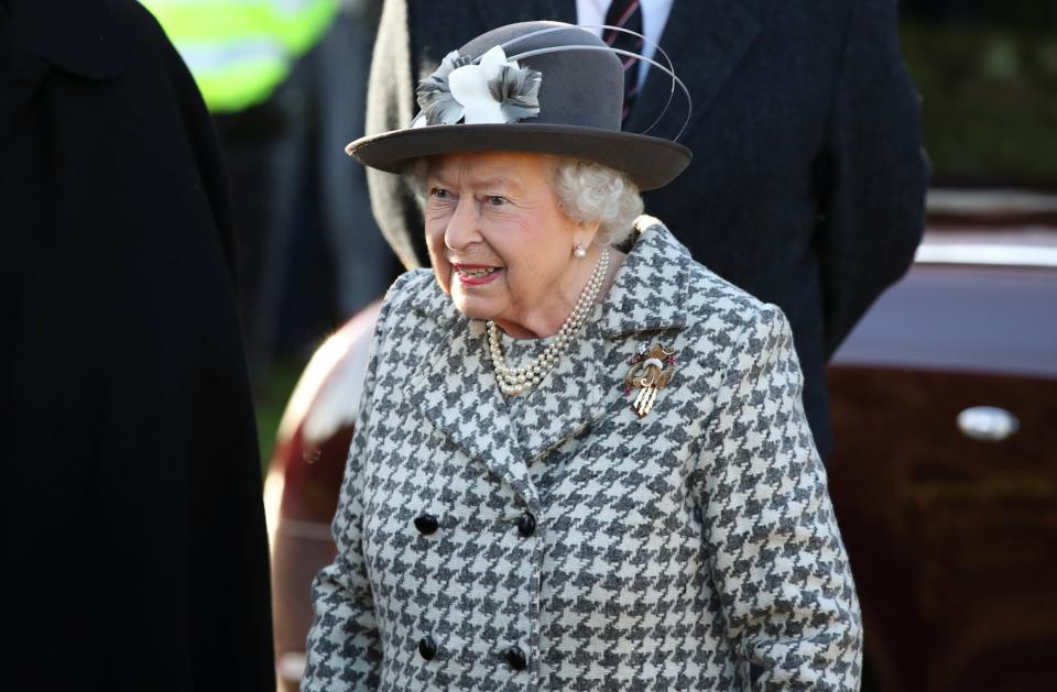 The monarch was pictured smiling on Sunday (REUTERS)