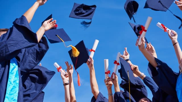 Graduates celebrating their achievement.