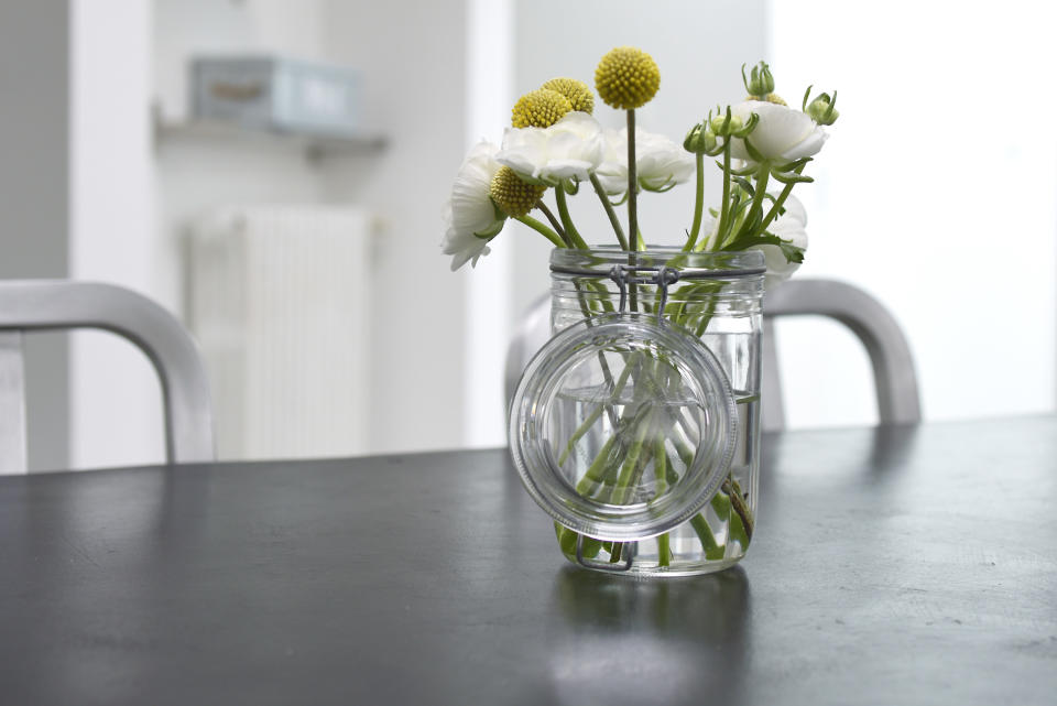 Mason jar with flower bouquet inside