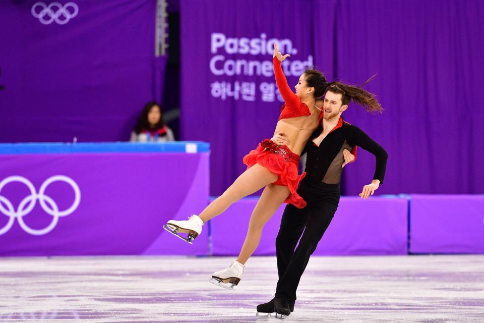 <p>South Korea’s Yura Min and South Korea’s Alexander Gamelin compete in the figure skating team event ice dance short dance during the Pyeongchang 2018 Winter Olympic Games at the Gangneung Ice Arena in Gangneung on February 11, 2018. / AFP PHOTO / Mladen ANTONOV </p>