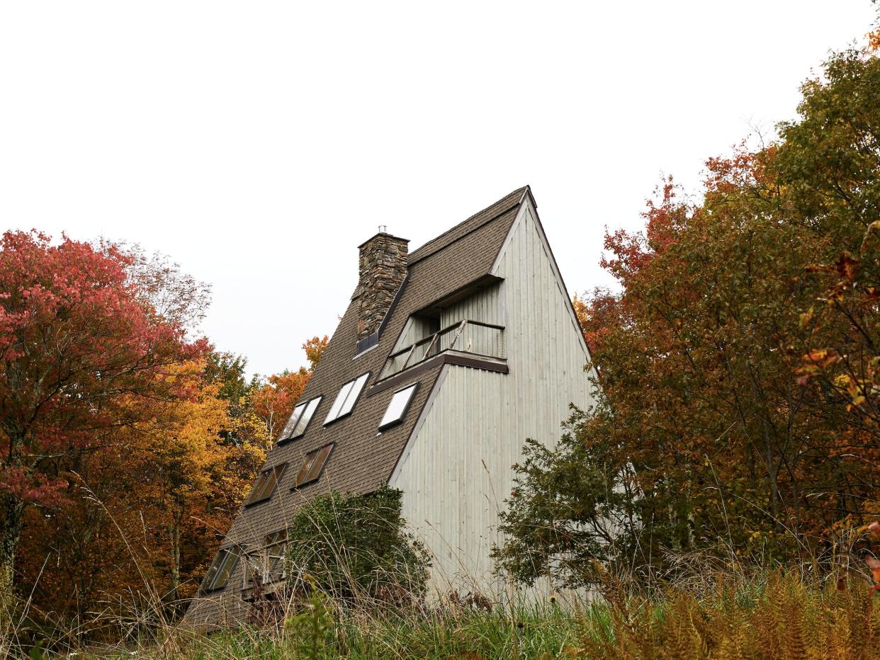 A triangular cabin in the mountains.