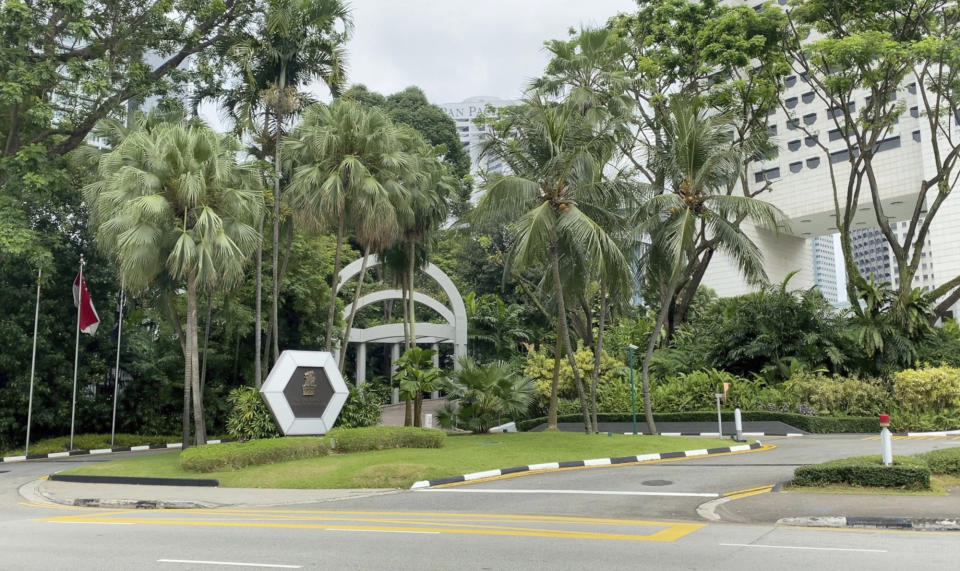 The Ritz-Carlton, Millennia Singapore hotel is pictured in Singapore on Feb. 10, 2021. British national Skea Nigel The Briton man pleaded guilty on Monday to violating a coronavirus quarantine order in Singapore to visit his fiancee. Nigel left his room at the hotel on three occasions in September, according to the charge sheets. He was not wearing a mask. (AP Photo/Annabelle Liang)