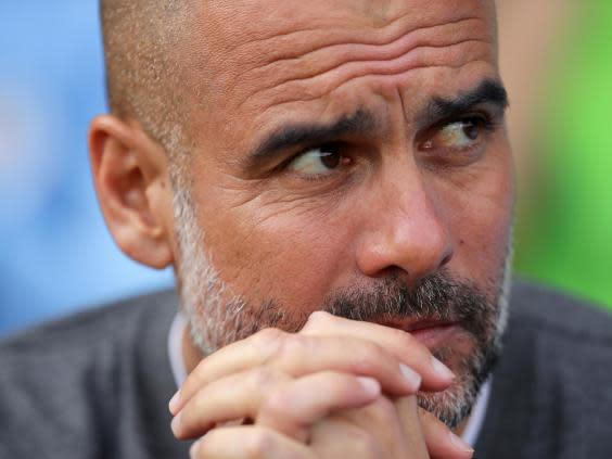 Guardiola has been more studious than usual as City push for the quadruple (Getty)