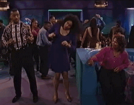 Characters dancing in a scene from "Living Single"