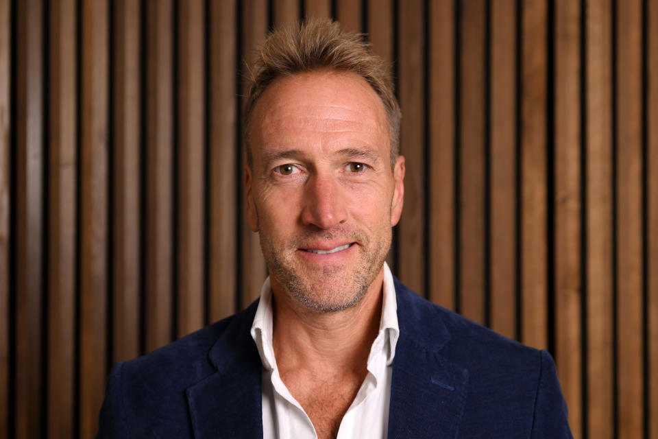 Ben Fogle wears a blue suit.