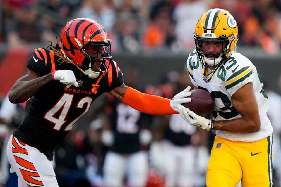 Green Bay Packers wide receiver <a class="link " href="https://sports.yahoo.com/nfl/players/34214" data-i13n="sec:content-canvas;subsec:anchor_text;elm:context_link" data-ylk="slk:Samori Toure;sec:content-canvas;subsec:anchor_text;elm:context_link;itc:0">Samori Toure</a> (83) competes a catch as Cincinnati Bengals cornerback <a class="link " href="https://sports.yahoo.com/nfl/players/34461" data-i13n="sec:content-canvas;subsec:anchor_text;elm:context_link" data-ylk="slk:Allan George;sec:content-canvas;subsec:anchor_text;elm:context_link;itc:0">Allan George</a> (42) defends in the second quarter during a Week 1 NFL preseason game between the Green Bay Packers and the Cincinnati Bengals,Friday, Aug. 11, 2023, at Paycor Stadium in Cincinnati.