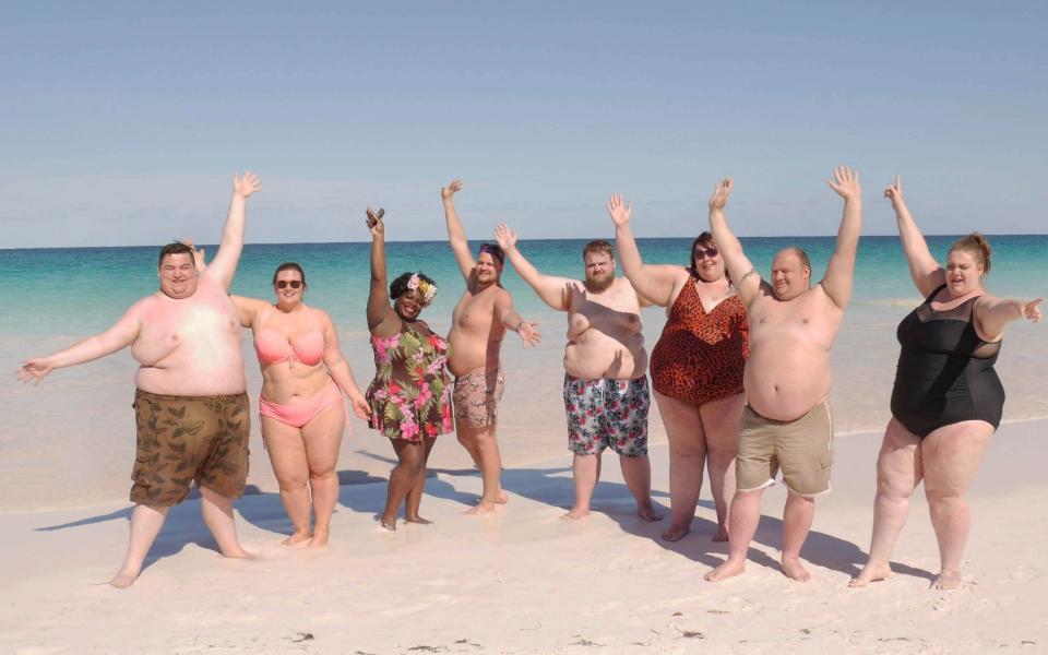 Steven, Holly, Sandra, David, Dane, Alice, Adam and Ami (l-r) bare their bodies on the beach at the world's only plus size friendly hotel, The Resort in the Bahamas - ITV