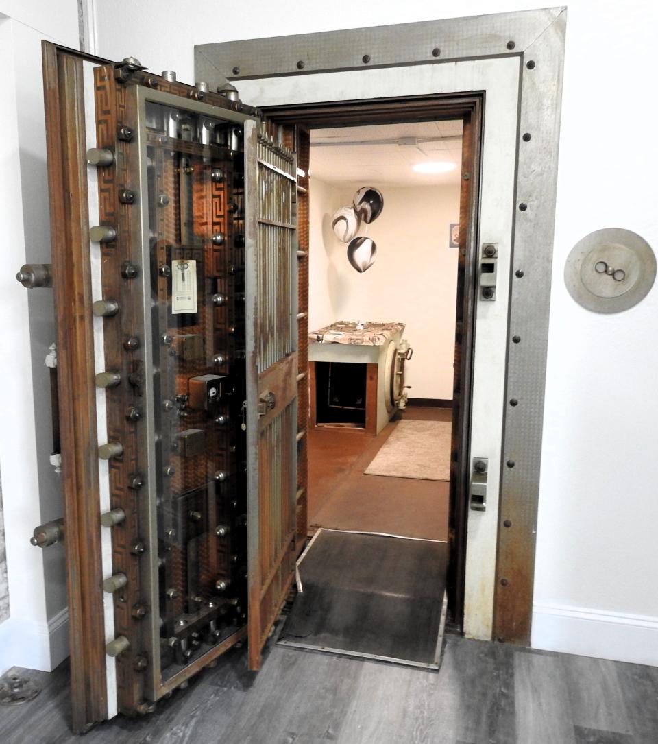 A vault has been converted into a dining area with a television at new Heavenly Sweets outlet in West Lafayette in the Brickstone Building.