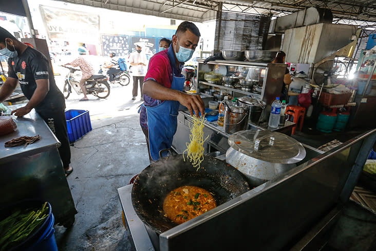 Each plate of 'mee manja' has a mix of ingredients fried in a special gravy before the noodles are added.