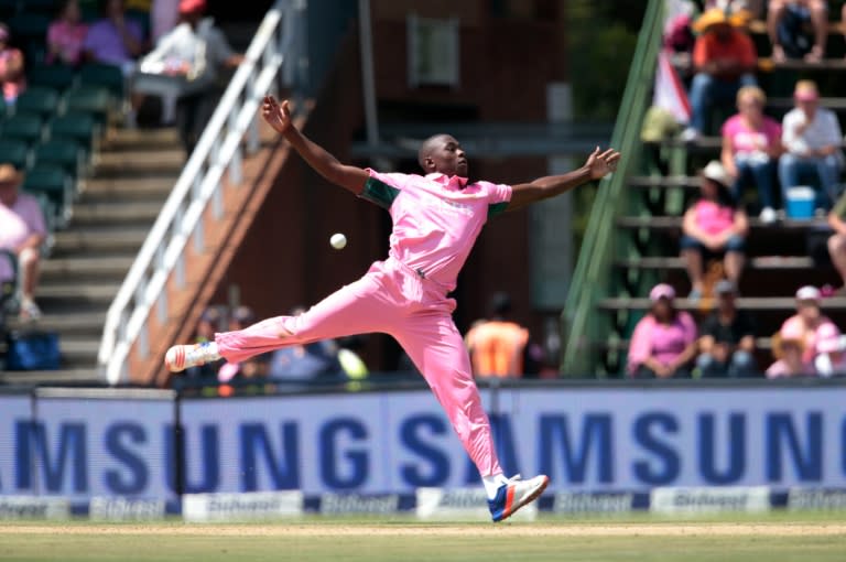 South African bowler Kagiso Rabada attempts to field on his own delivery during the fourth One Day International cricket match between England and South Africa at Wanderers on February 12, 2016 in Johannesburg, South Africa