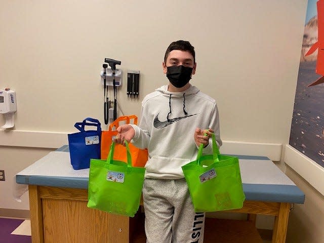 Brandon Kopp, age 12, delivering "keto bags" to patients at the Children's Hospital of Philadelphia.