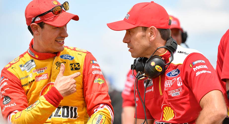Crew chief Paul Wolfe and Joey Logano chat before the start of the 2022 Cup Series Playoffs at Darlington Raceway