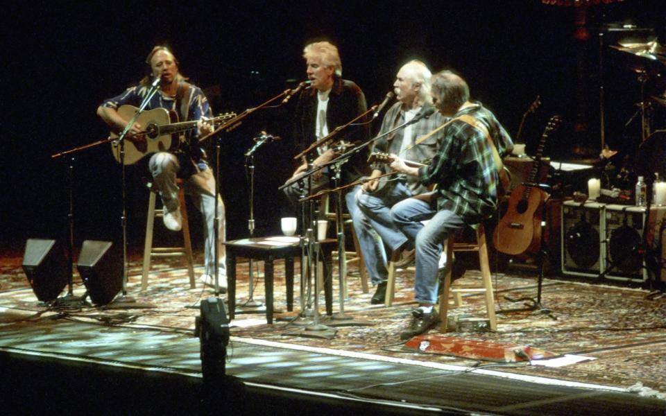 Crosby, Stills, Nash & Young on stage in 1970 - Getty