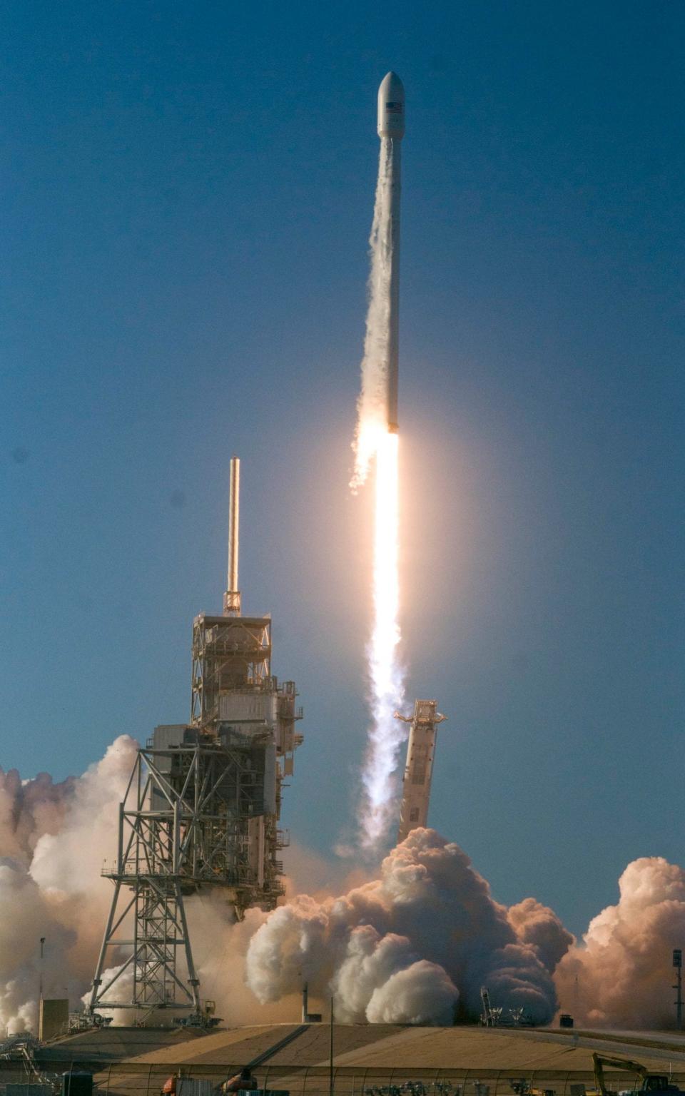 A SpaceX Falcon 9 lifts off from Kennedy Space Center on May 15, 2017 in Kennedy Space Center, Florida. The rocket is carrying a commercial communications satellite - Credit: Barcroft Media 