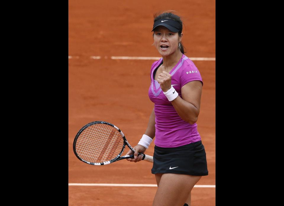 China's Li Na reacts after a point against Kazakhstan's Yaroslava Shvedova during their Women's Singles 4sth Round tennis match of the French Open tennis tournament at the Roland Garros stadium in Paris.      (PATRICK KOVARIK/AFP/GettyImages)