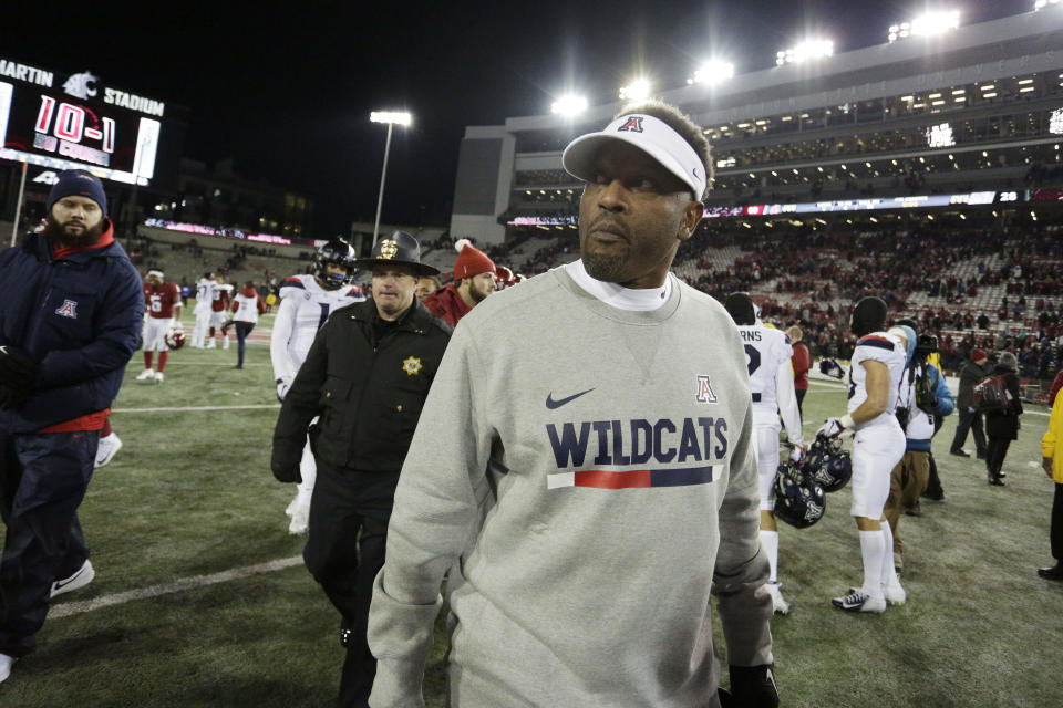 Arizona head coach Kevin Sumlin walks on the field after an NCAA college football game against Washington State in Pullman, Wash., Saturday, Nov. 17, 2018. (AP Photo/Young Kwak)