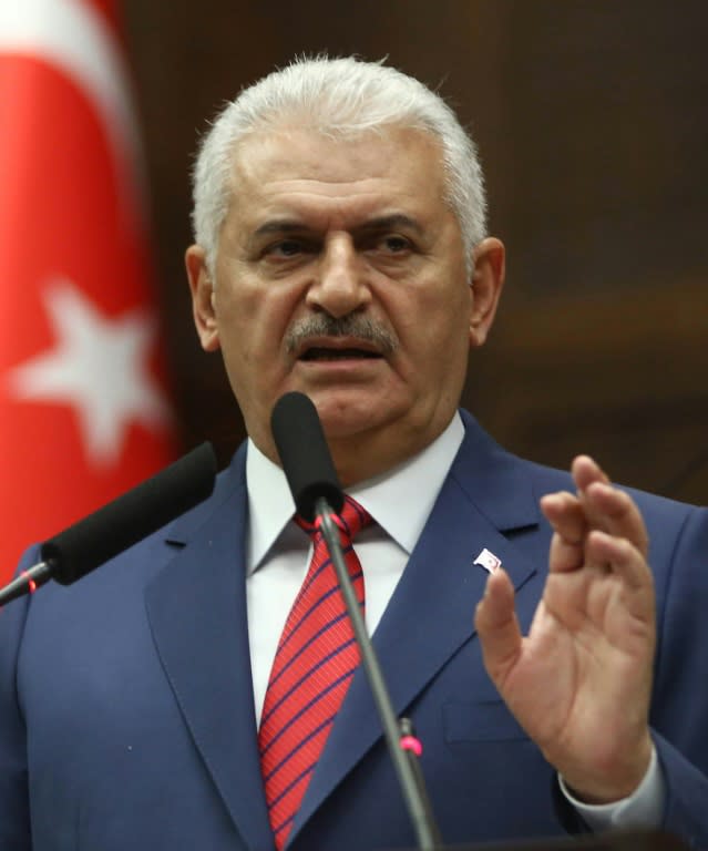 Turkish Prime Minister Binali Yildirim delivers a speech during a meeting of the ruling Justice and Development Party (AK Party) in Ankara, on June 28, 2016