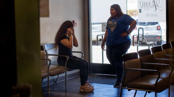 PHOTO: A patient is brought to tears as a staff member informs her  that the clinic can no longer provide services at Alamo Womens Reproductive Service in San Antonio, Texas, June 24, 2022.  (Los Angeles Times via Getty Images, FILE)