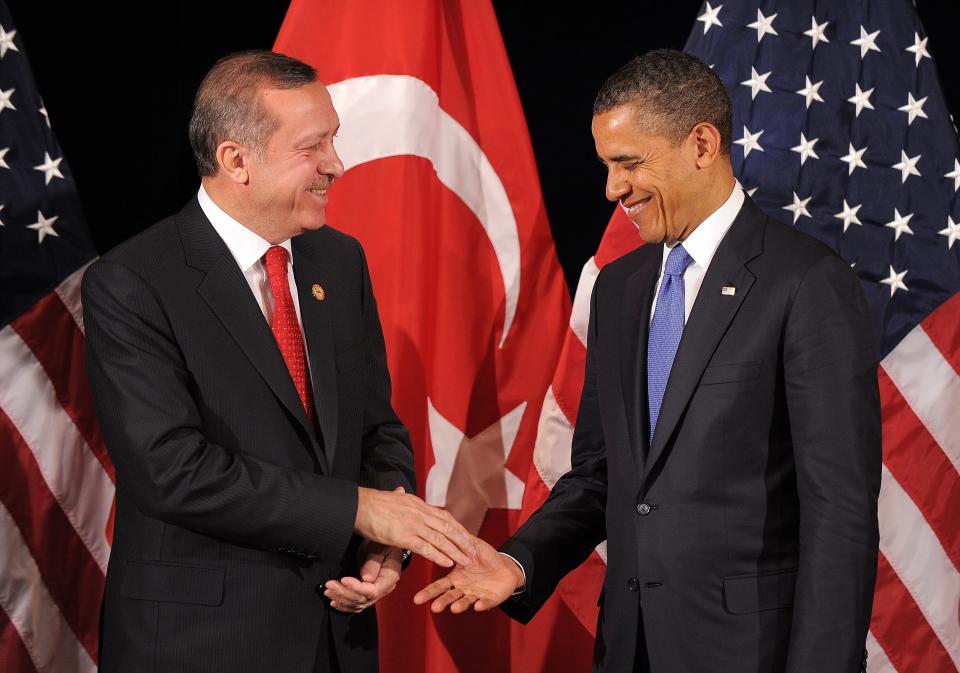 U.S. President Barack Obama (R) shakes hands with Turkish Prime Minister Recep Tayyip Erdogan after their bilateral meeting in Seoul on March 25, 2012 on the eve of the 2012 Seoul Nuclear Security Summit.