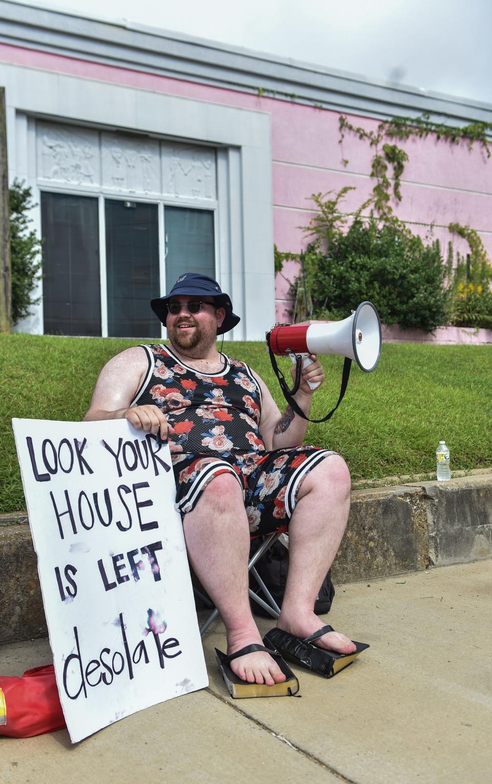 Beau Black, 33, rallies for abortion while wearing two bibles as shoes outside of the Jackson Women’s Health Organization on the last day the clinic is legally allowed to be open in Jackson, Miss., Wednesday, July 6, 2022.